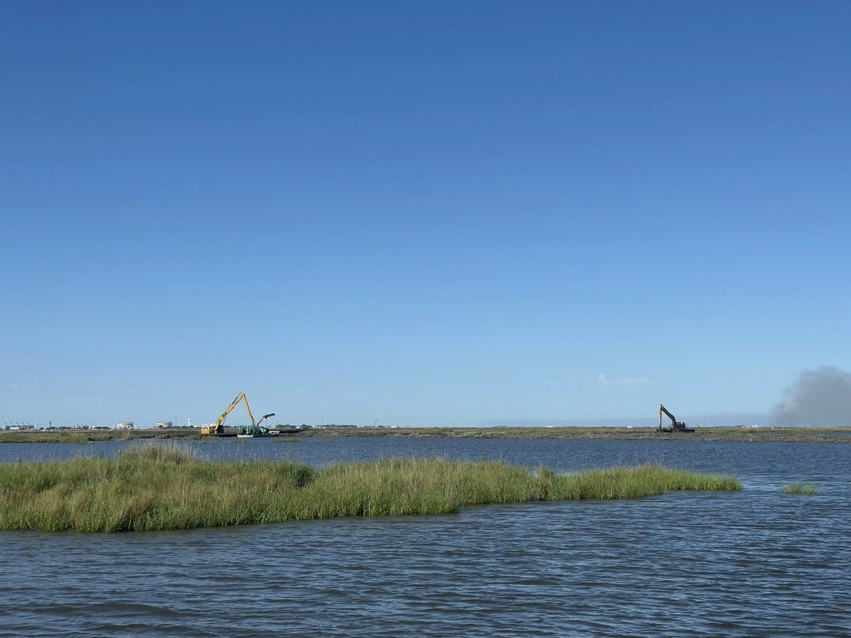 Waterfront scene with construction equipment